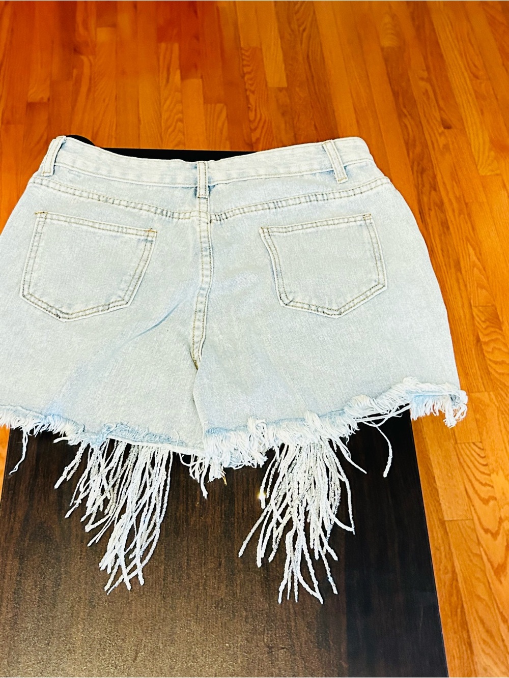 Fringed Light Wash Denim Shorts